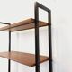 Vintage modular secretary bookshelf in teak and metal.