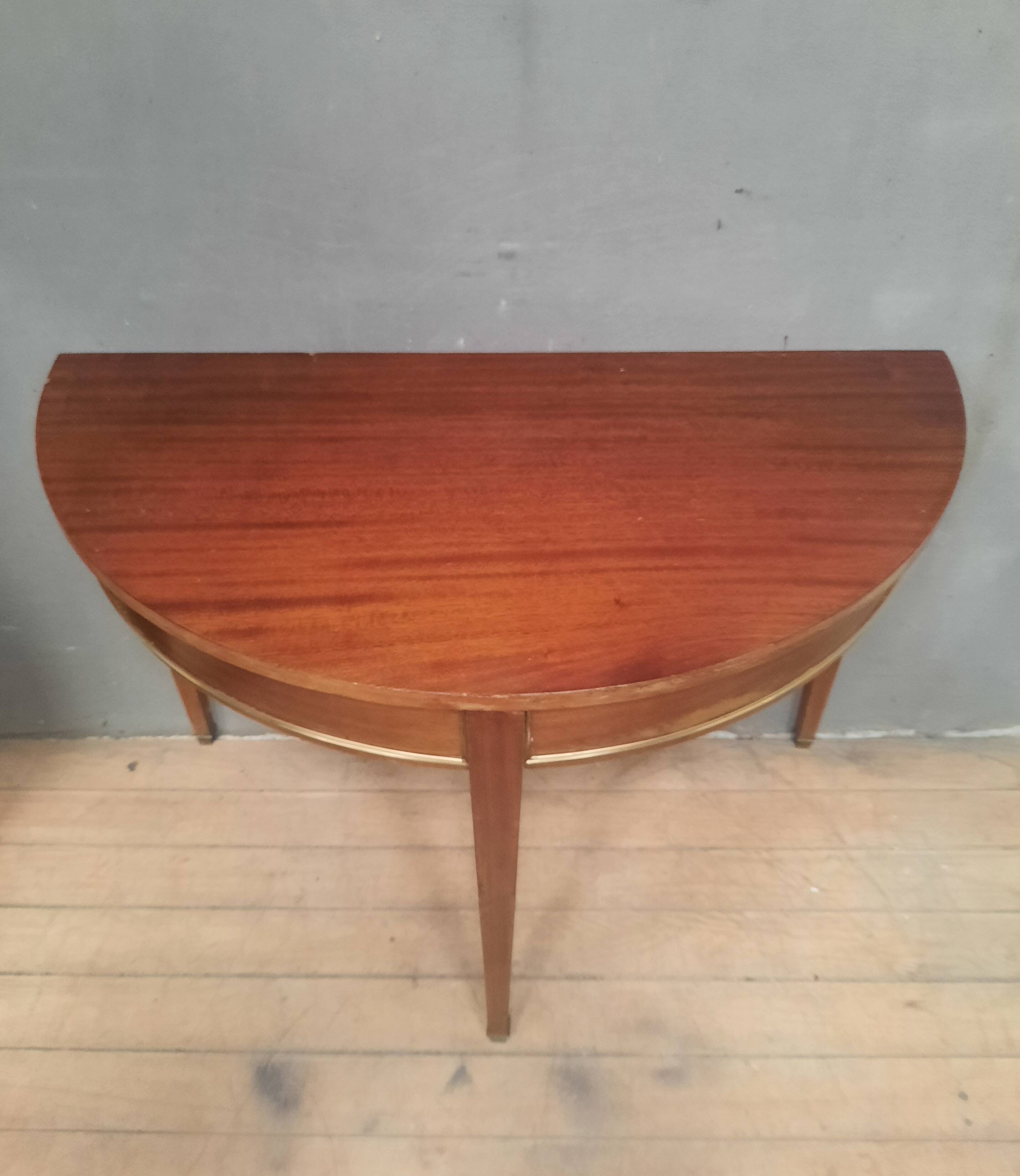 Louis XVI style console in mahogany.