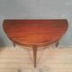 Louis XVI style console in mahogany.