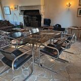 Dining table set with 6 Pieff chairs.