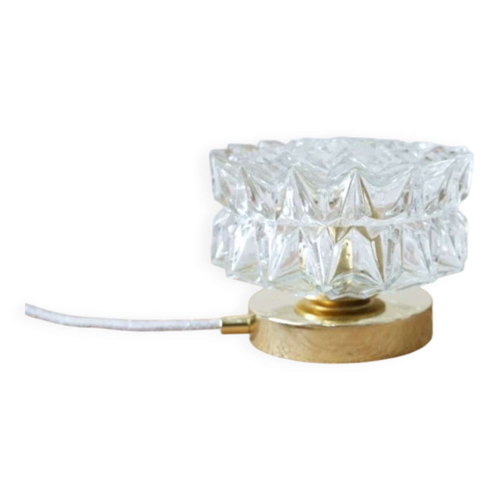 Table lamp with cut glass in the shape of a star.