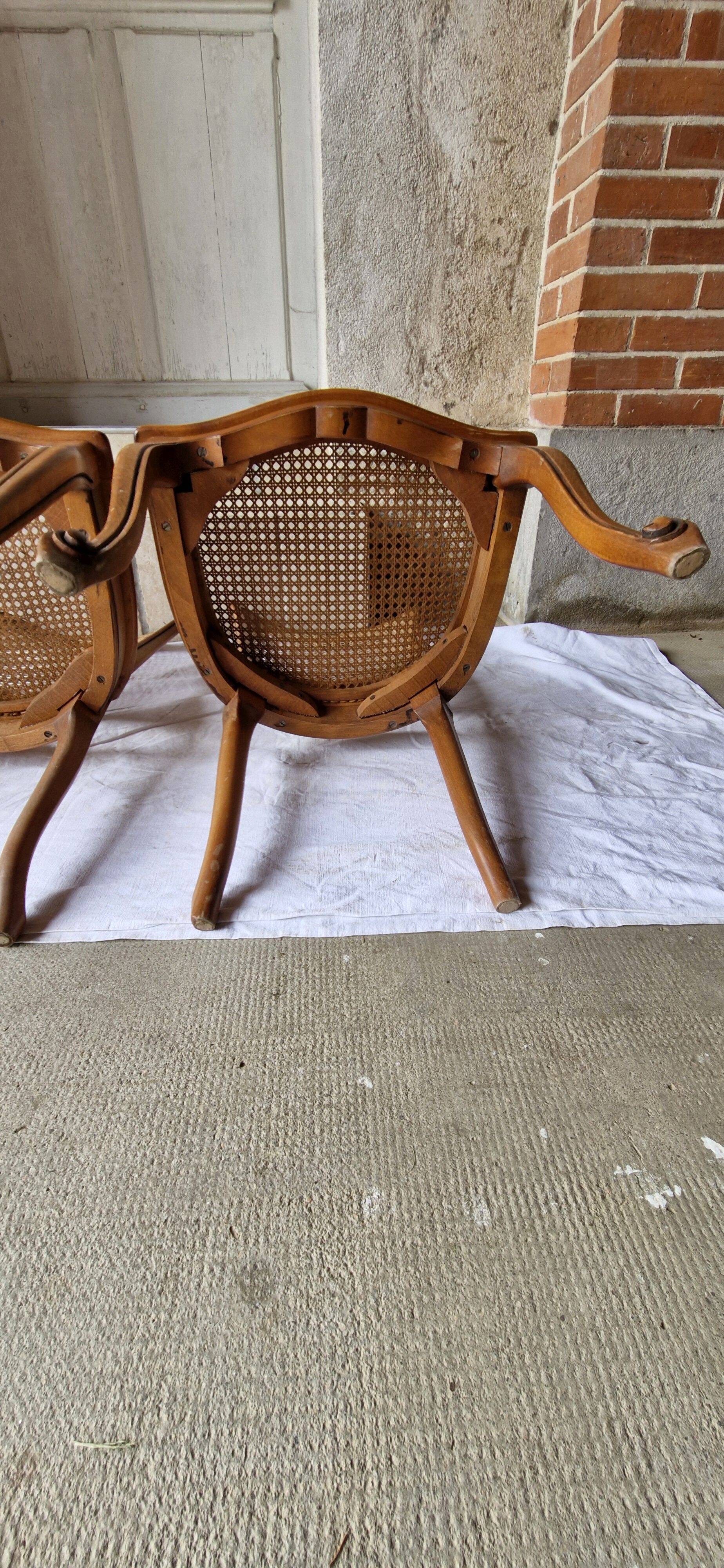 5 old cane-seated solid oak chairs.