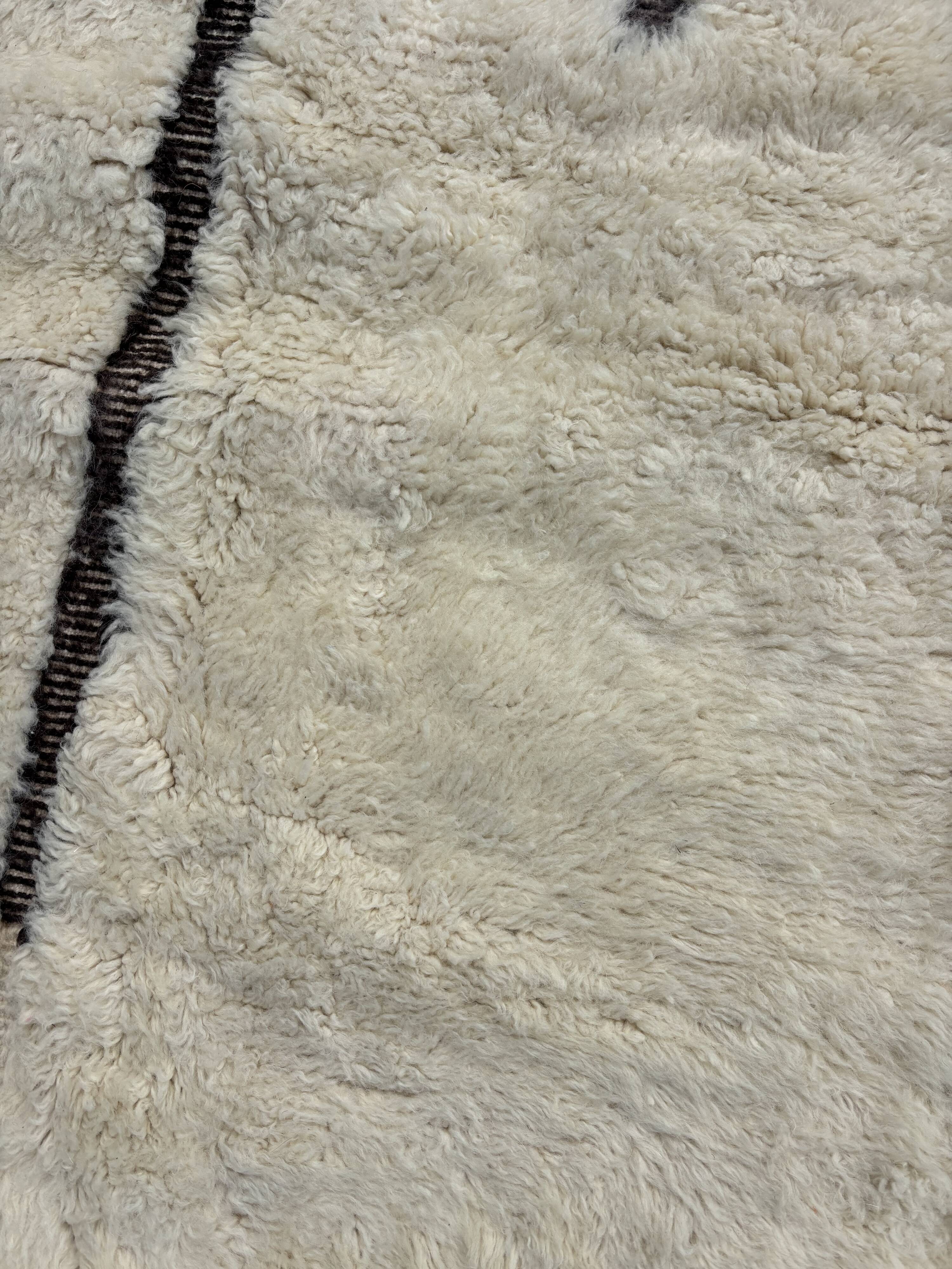 Large Berber M'rirt rug in cream and black wool, Moroccan rug.