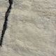 Large Berber M'rirt rug in cream and black wool, Moroccan rug.