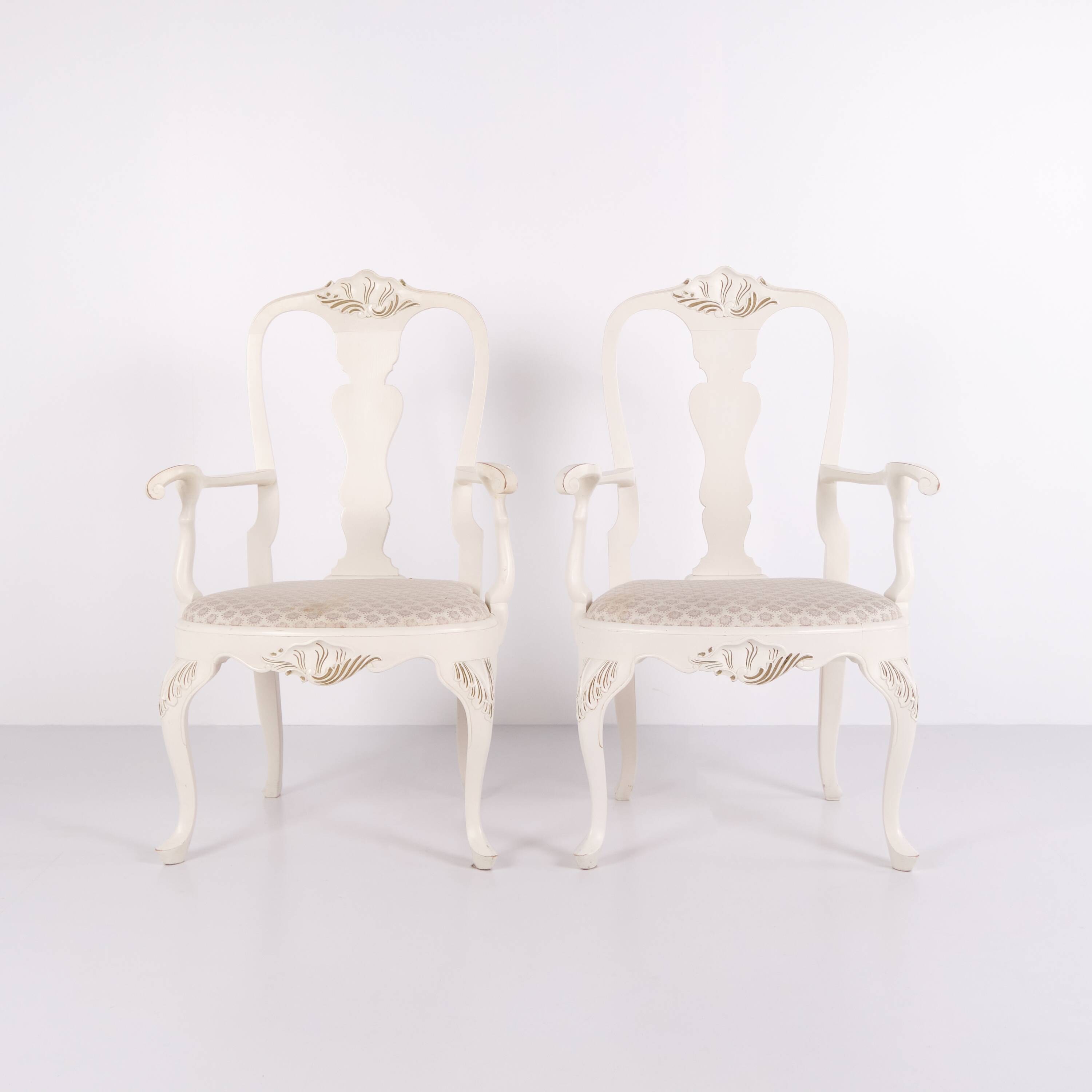 A pair of armchairs – neo rococo style – white painted with decorative details – 1920s
