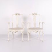 A pair of armchairs – neo rococo style – white painted with decorative details – 1920s