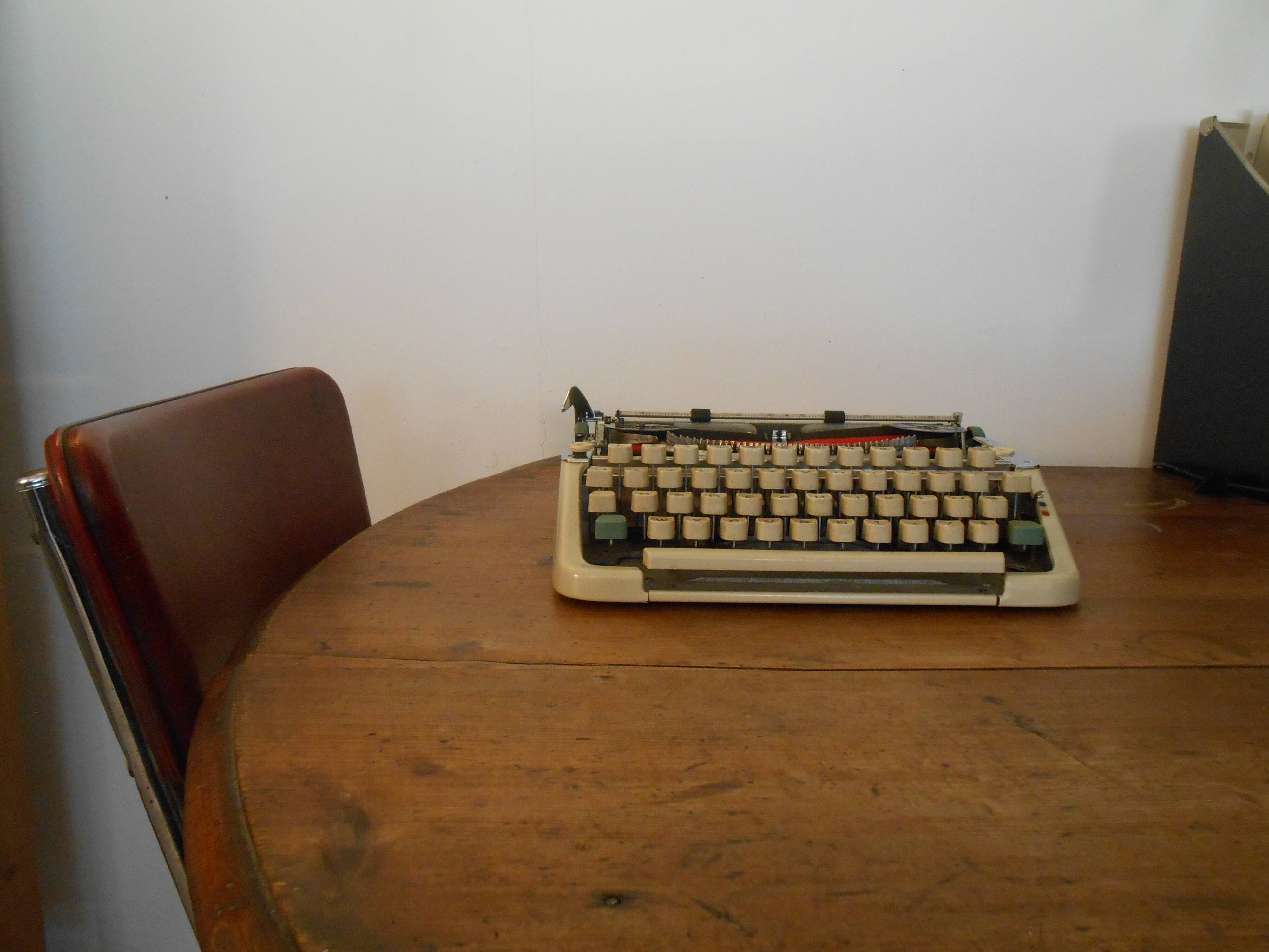 Typewriter Olympia 66, with cover