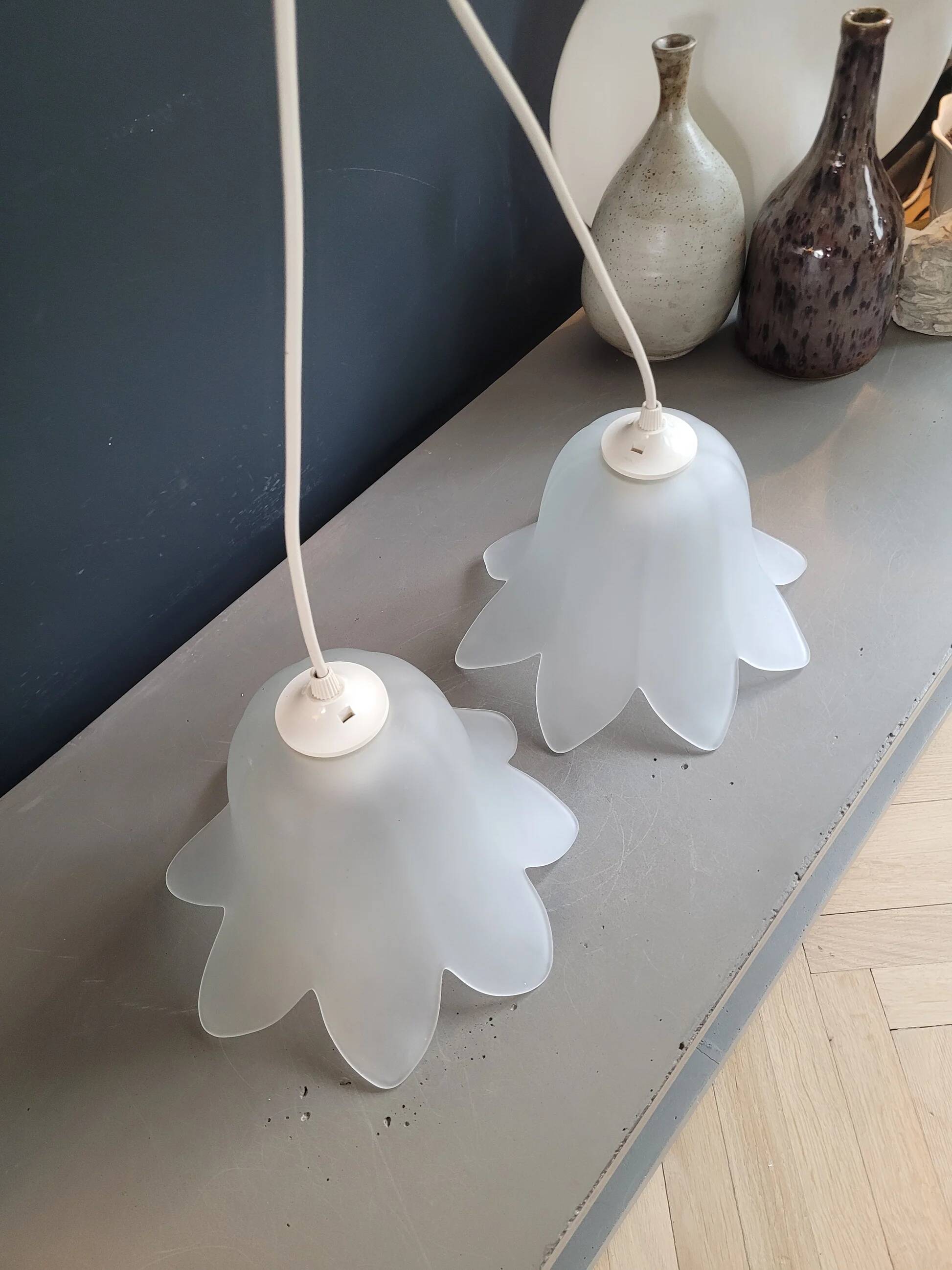 Pair of frosted glass flower pendant lights