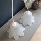Pair of frosted glass flower pendant lights