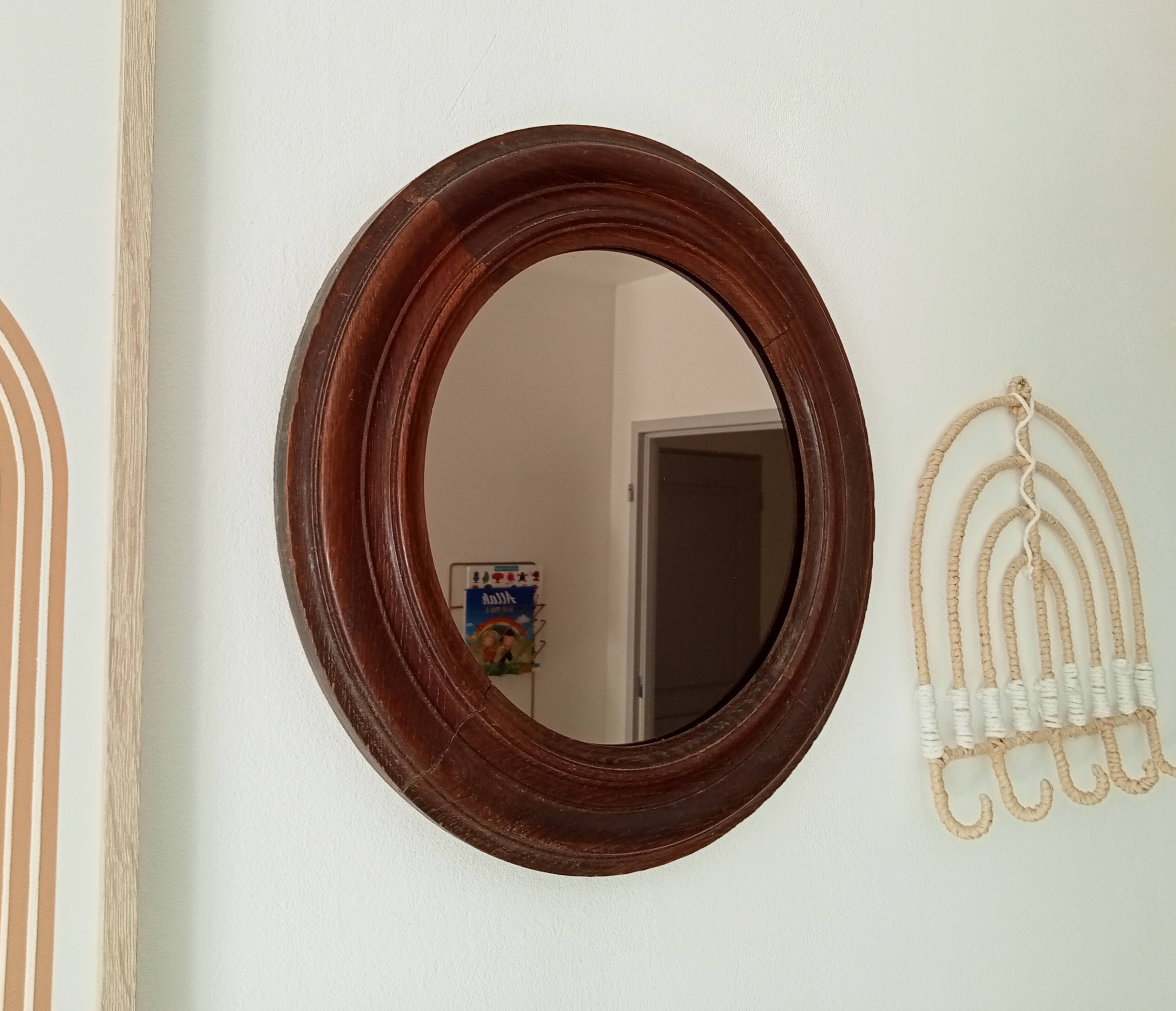 Antique round wooden mirror