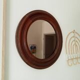 Antique round wooden mirror