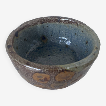 Stoneware empty pocket bowl with stylized floral decoration