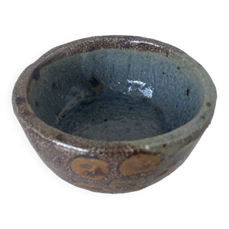 Stoneware empty pocket bowl with stylized floral decoration