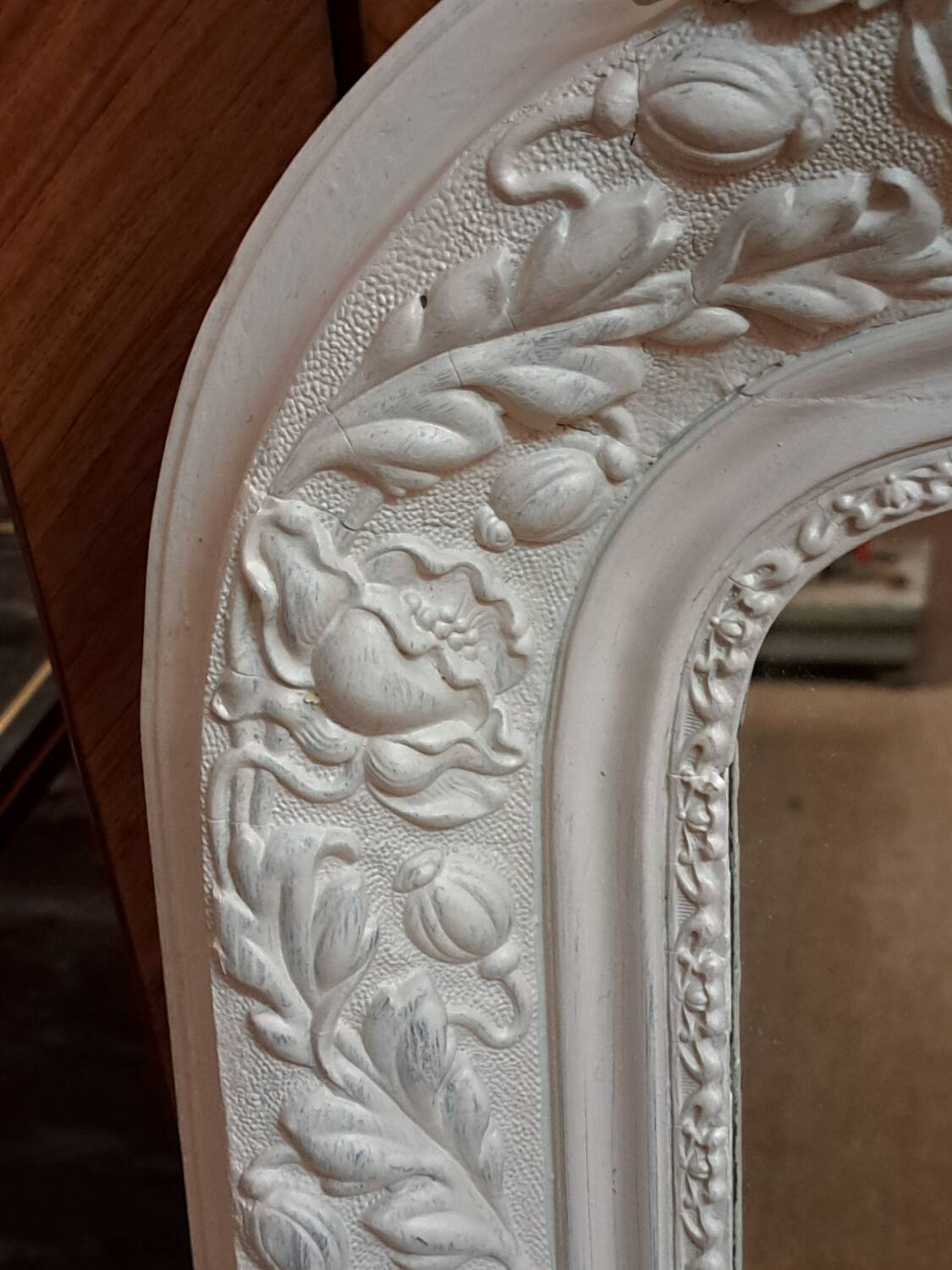 Louis Philippe mirror with patinated cartouche
