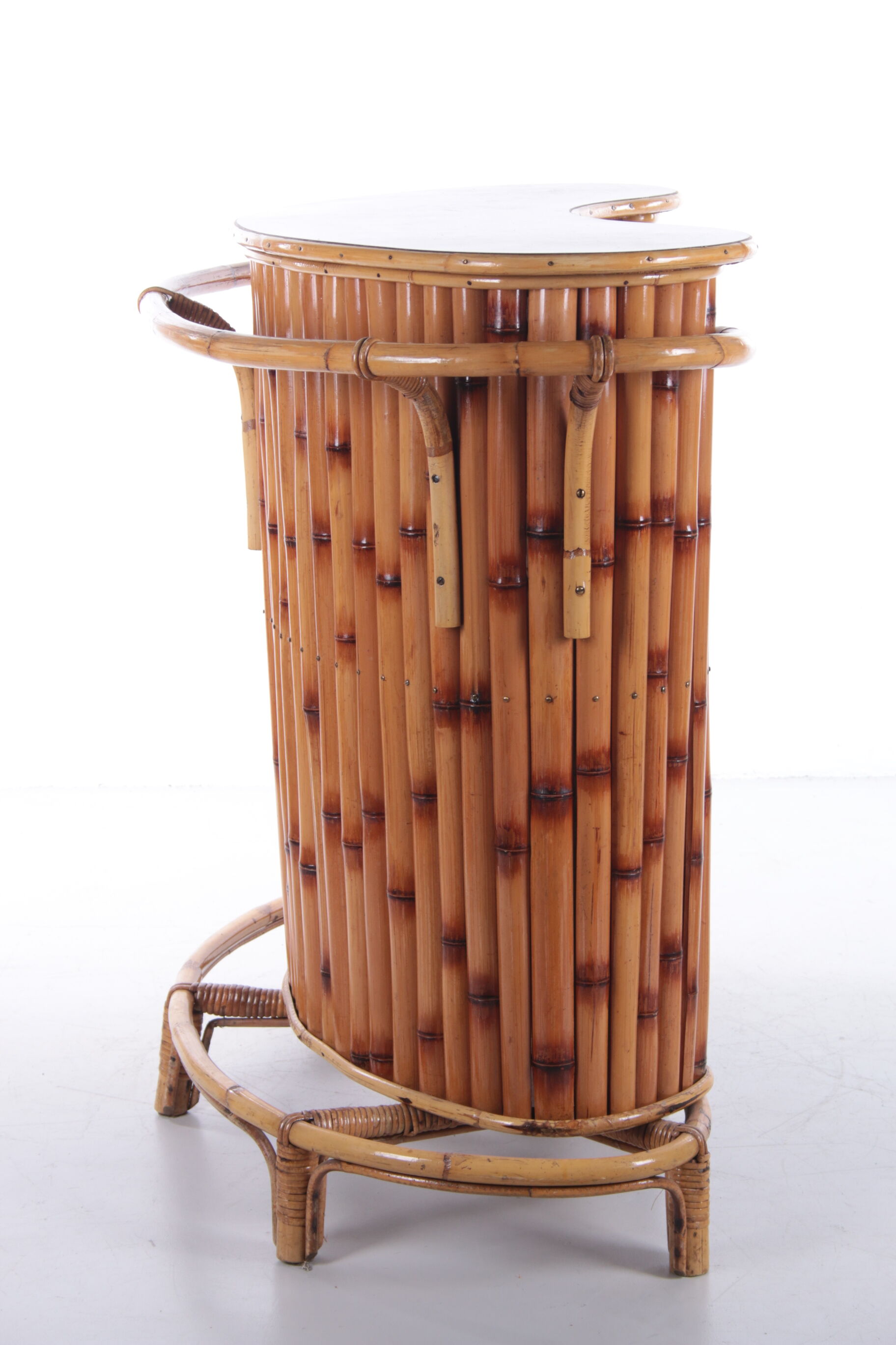 Vintage bamboo Tiki bar cocktail bar with 2 bar stools.