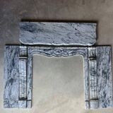 Pompadour fireplace in Louis XV style from around 1880 in blue floral marble.