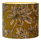 Lampshade dressed in a modern tropical-inspired pattern blending
