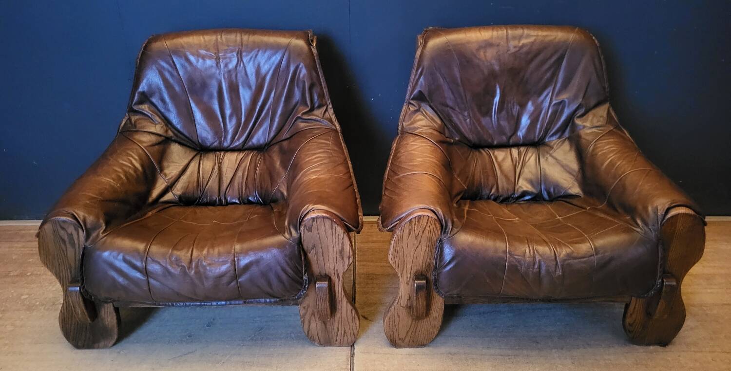 Pair of Vintage Brutalist armchairs from the 60s in leather and solid oak