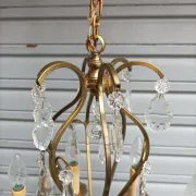 Remarkable cage chandelier with 6 lights and complete crystal pendants in working condition.