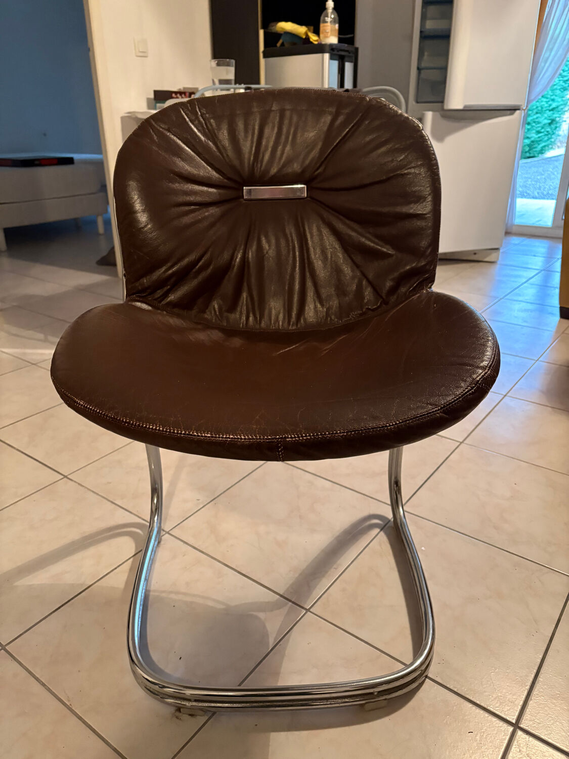 Table and chairs in the style of Gastone Rinaldi.