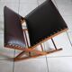 Vintage rocking footrests in wood and faux leather