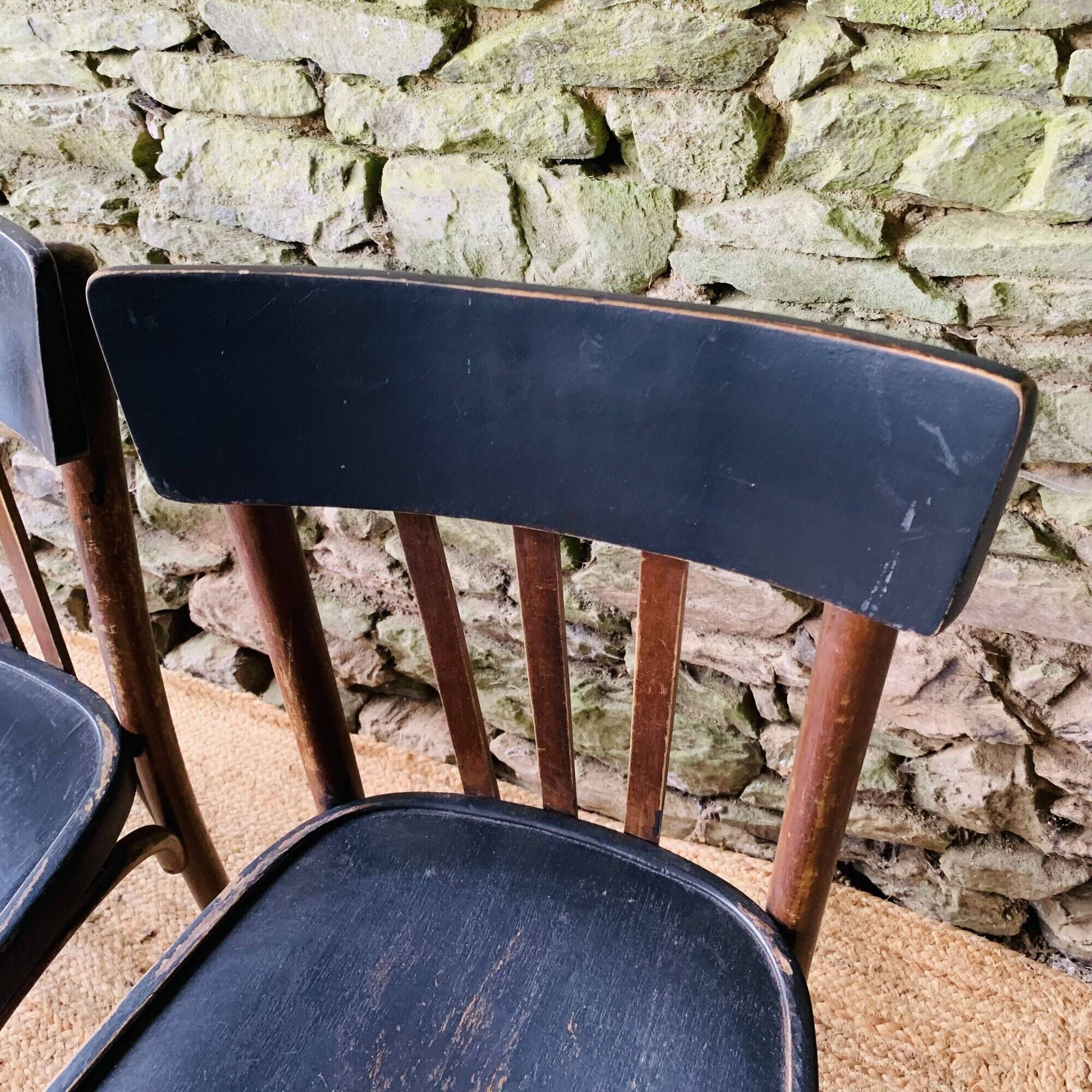 Set of four vintage bentwood bistro chairs.