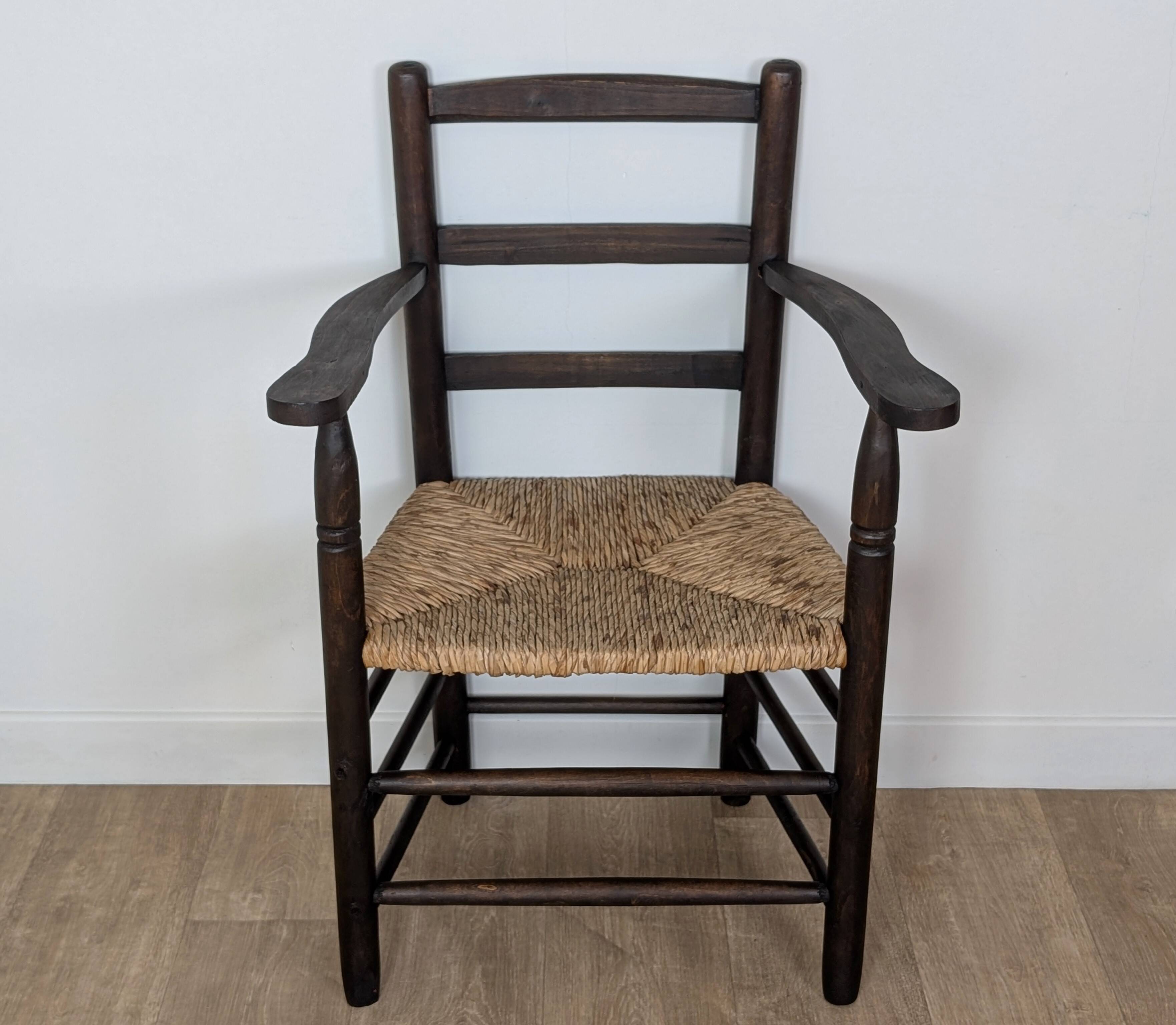 Wooden straw armchair