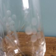 Cut glass soliflore vase with a smoked glass base.