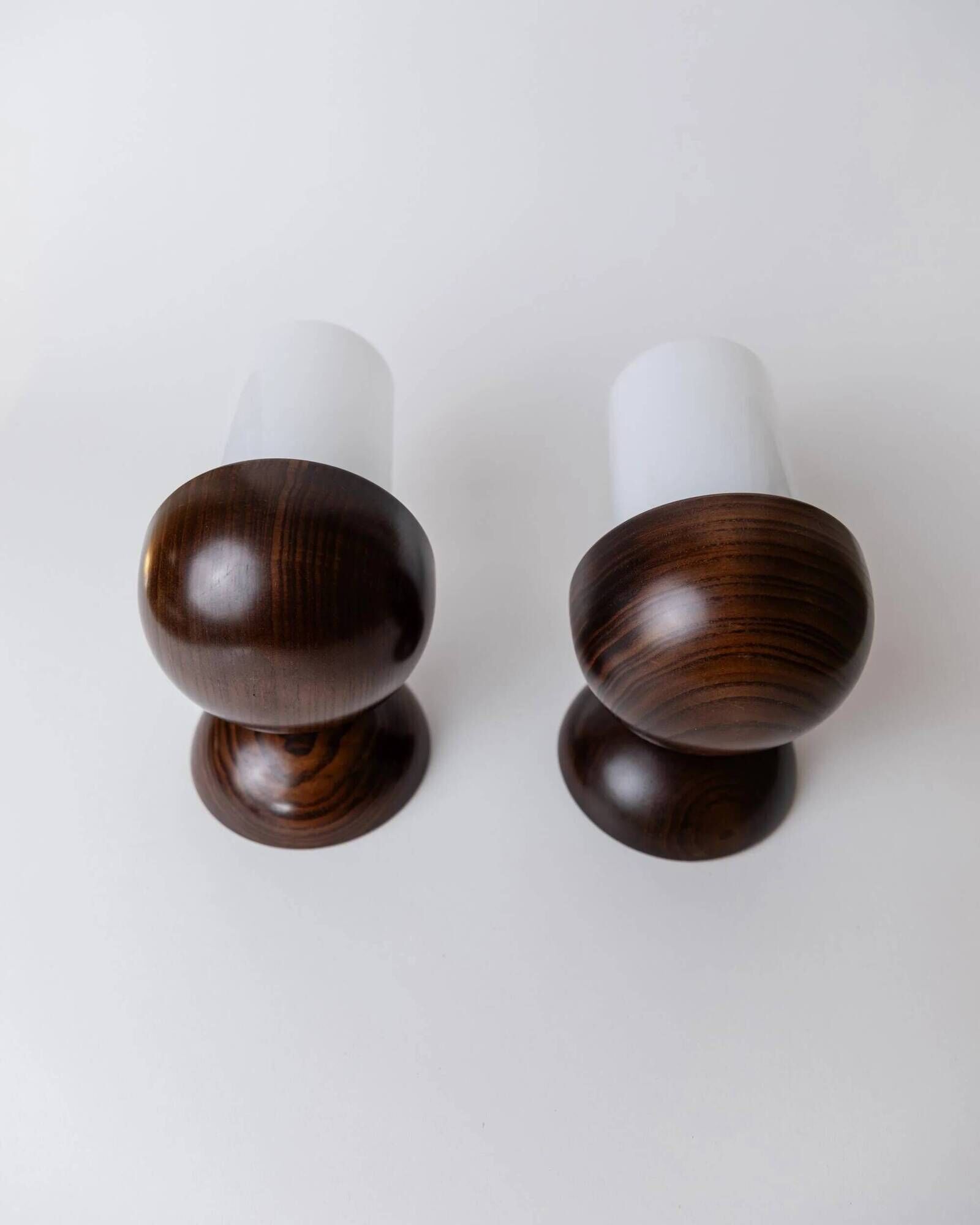 Vintage wall sconces from the 1960s, set of 2, dark wood with white glass shades, Mid-Century Modern lighting, sculptural wall sconces.