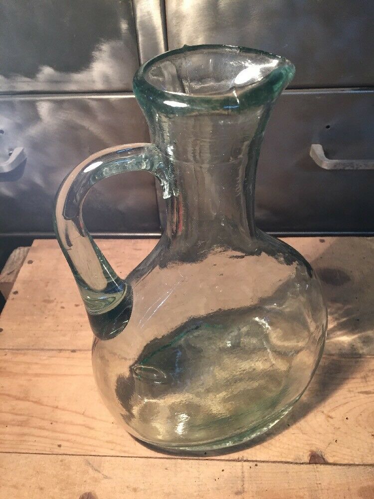 Bluish green glass decanter