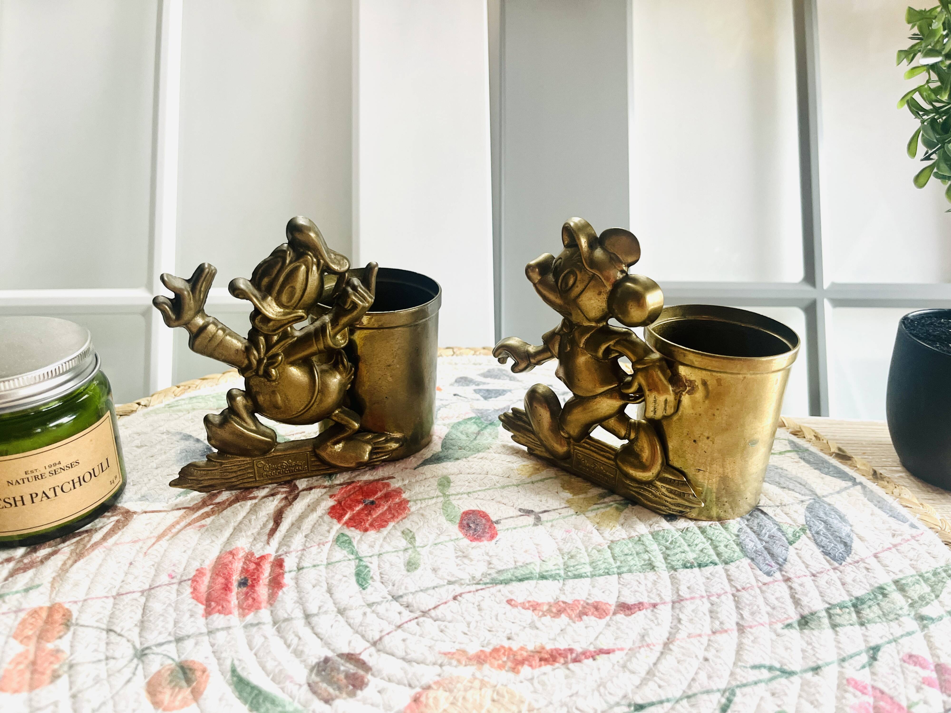 Rare brass yellow Disney pencil holders. 1960p