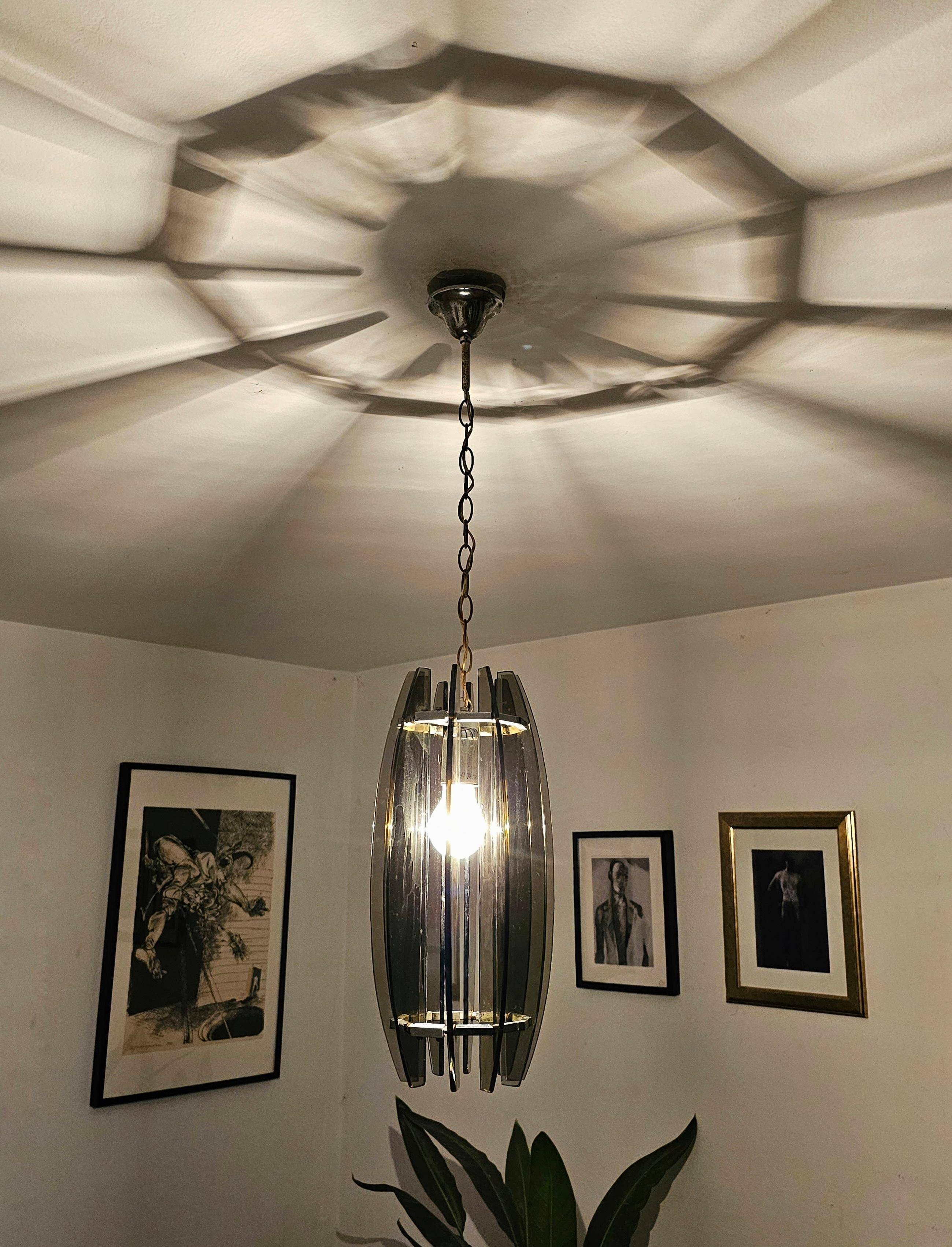 Glass chandelier, chrome and smoked glass in the Fontana Arte style from the 1970s.