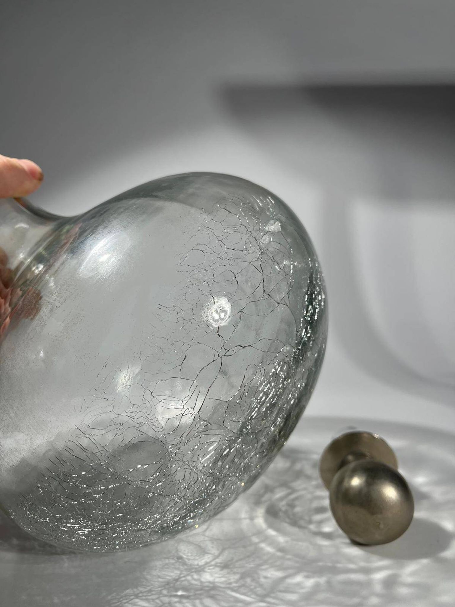 vintage cracked glass carafe with metal stopper