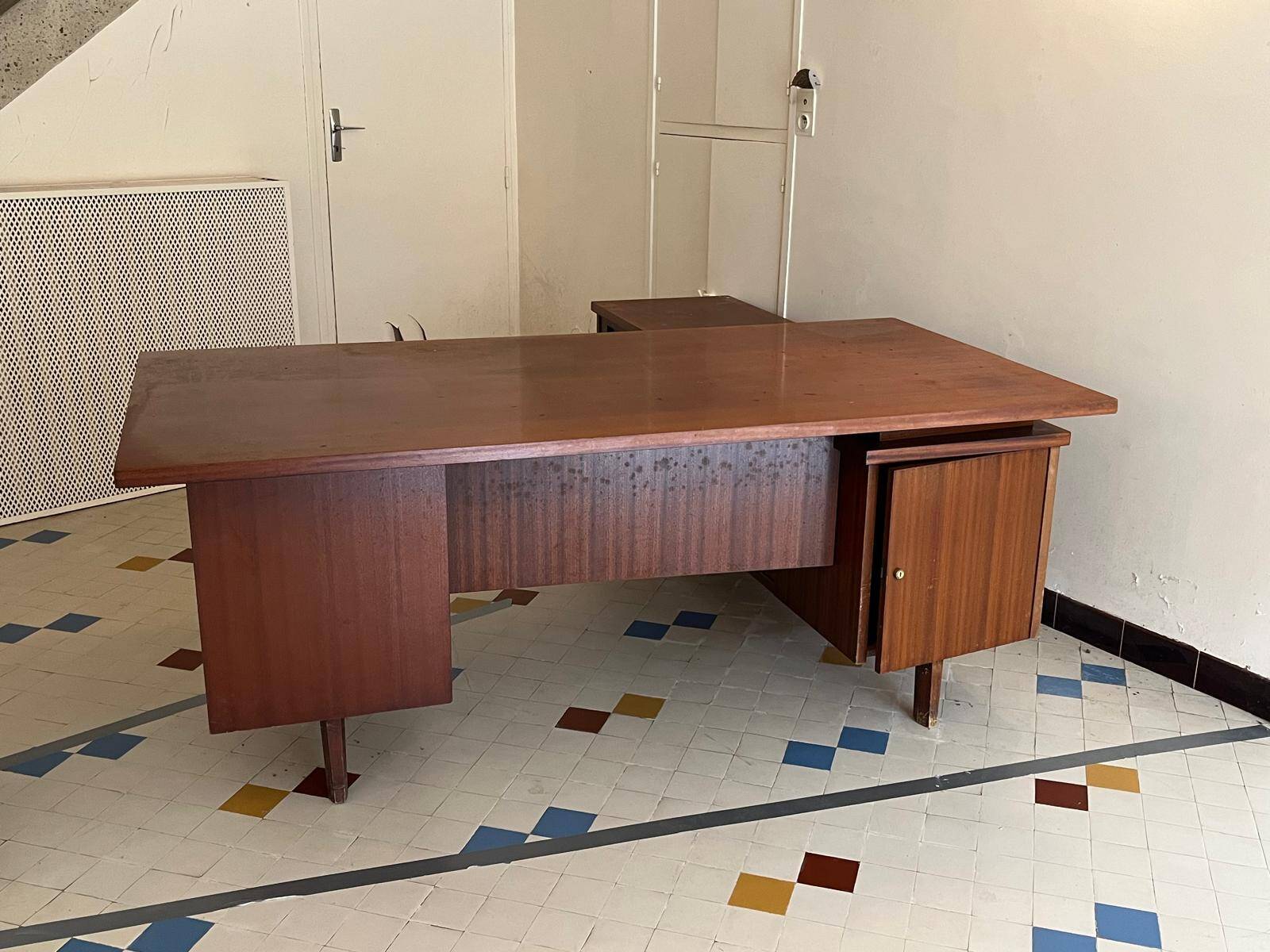 Vintage mahogany executive desk with bar.