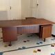 Vintage mahogany executive desk with bar.