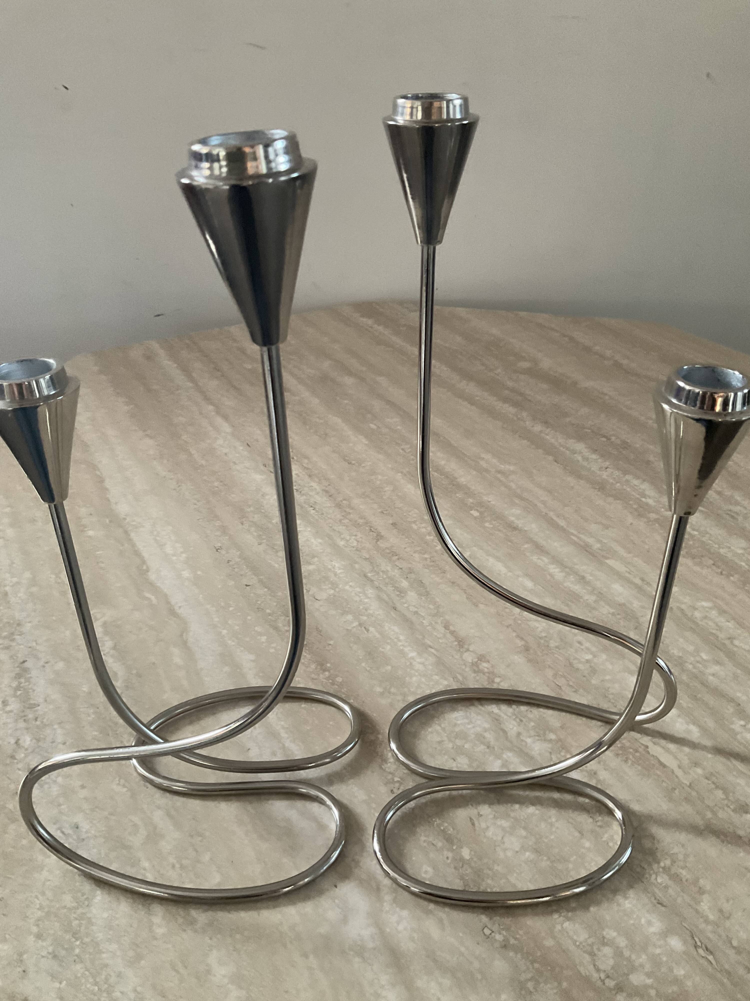 Pair of modernist silver metal candlesticks
