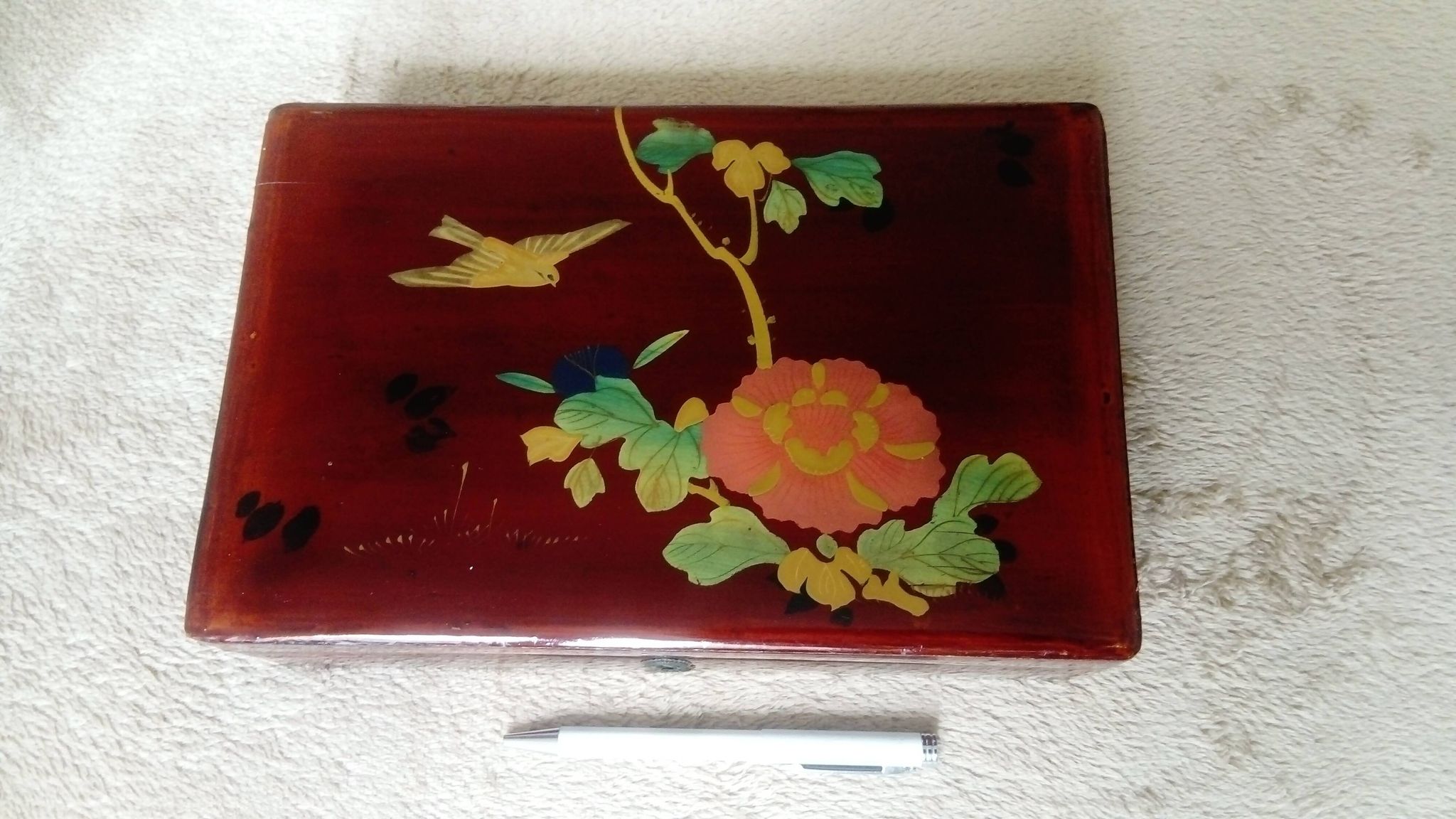 Old lacquered wooden box with china or japan decoration, bird and flower