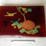 Old lacquered wooden box with china or japan decoration, bird and flower
