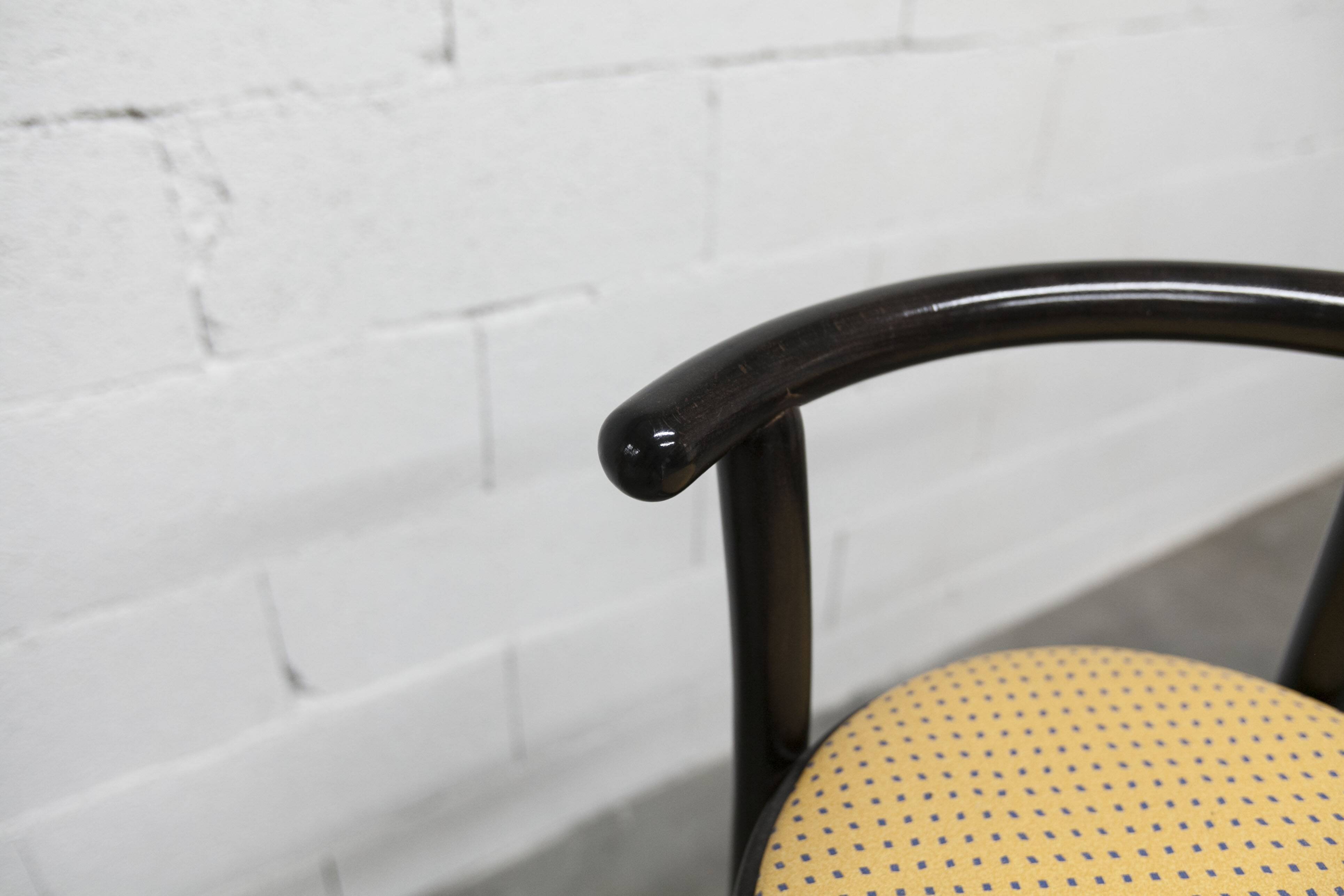 Pair of Baumann Dialog model stools in black and yellow and blue imitation leather, 1990