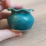 Small handmade turquoise pottery.