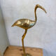 Ibis or heron in gilded brass