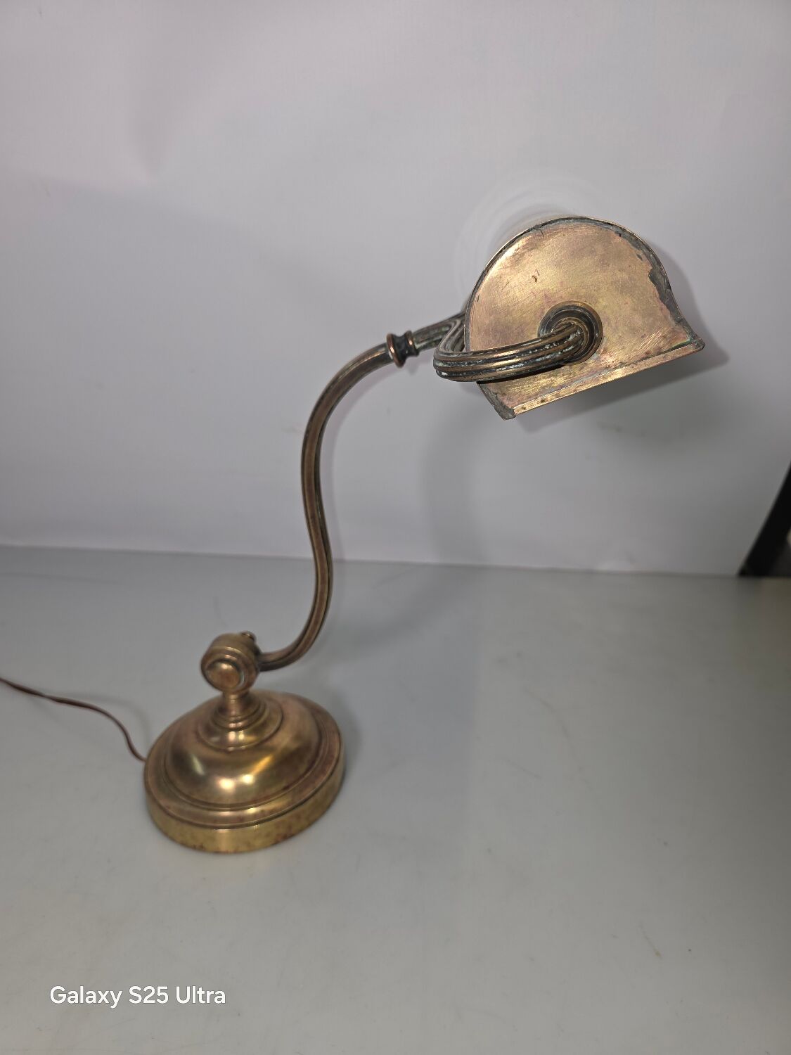 Antique brass desk lamp from a notary.