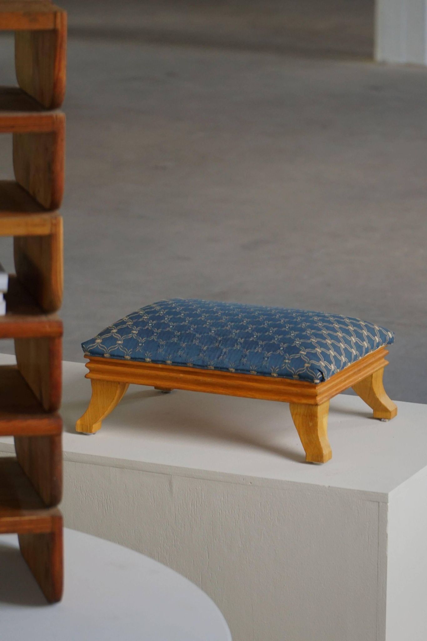 French Art Deco low stool with vintage upholstery made in the 1940s.
