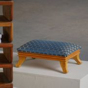 French Art Deco low stool with vintage upholstery made in the 1940s.