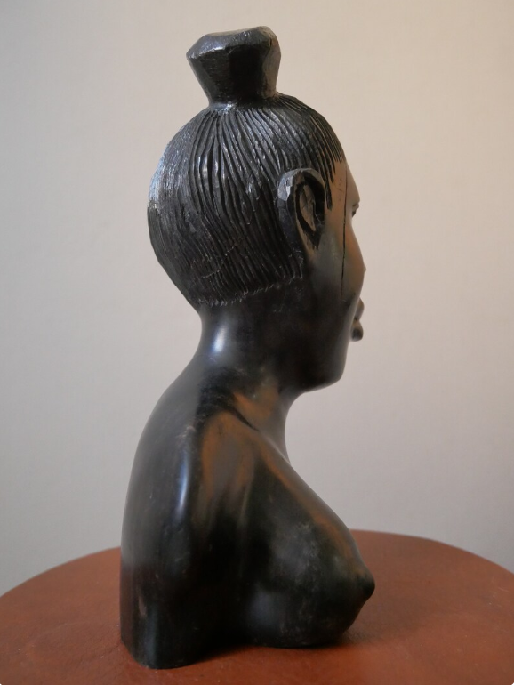 Bust of a woman in ebony African Art