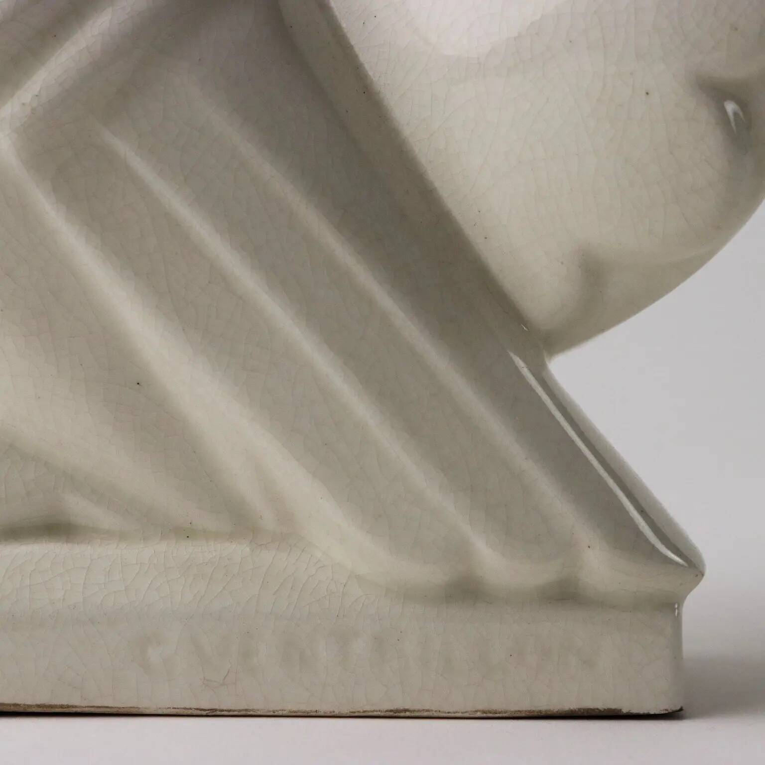 Ancient ceramic pigeon sculpture by George Ventrillon for Saint Clément.