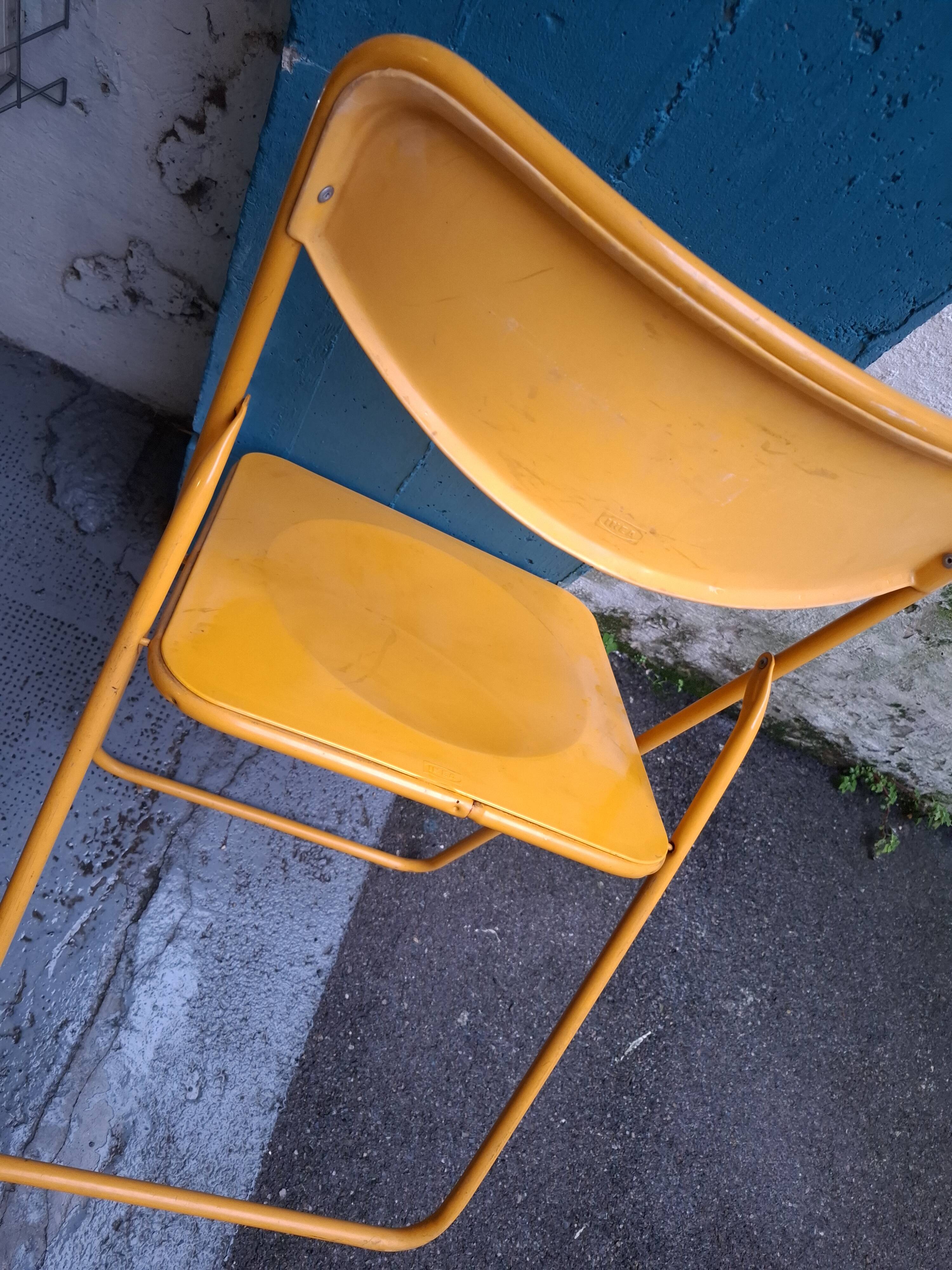 Two ikea folding chairs, niels gammelgaard