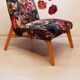 Restored armchair in varnished wood and fabric