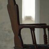 Scandinavian armchair in solid oak with cushion, folk art, early 19th century.