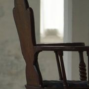 Scandinavian armchair in solid oak with cushion, folk art, early 19th century.